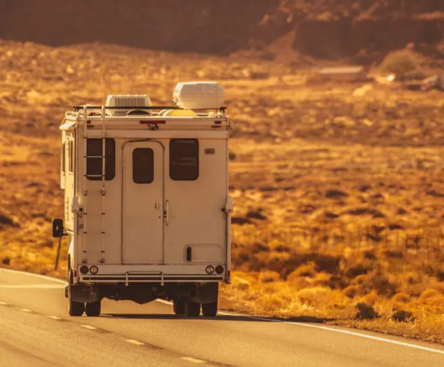 Photo of an RV in the desert