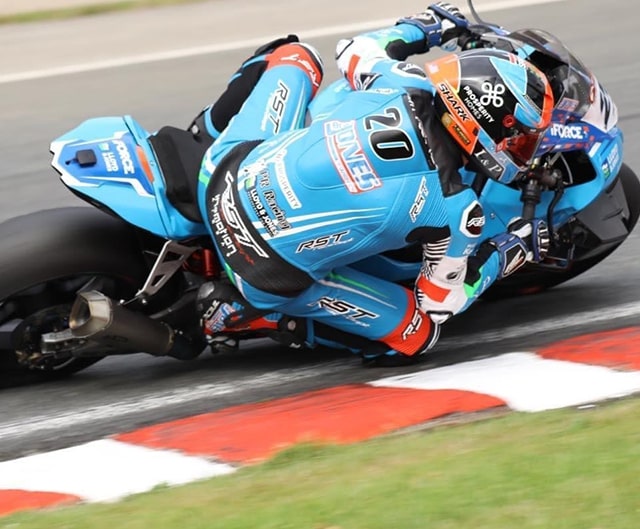 Photo of a motorcyclist making a tight turn